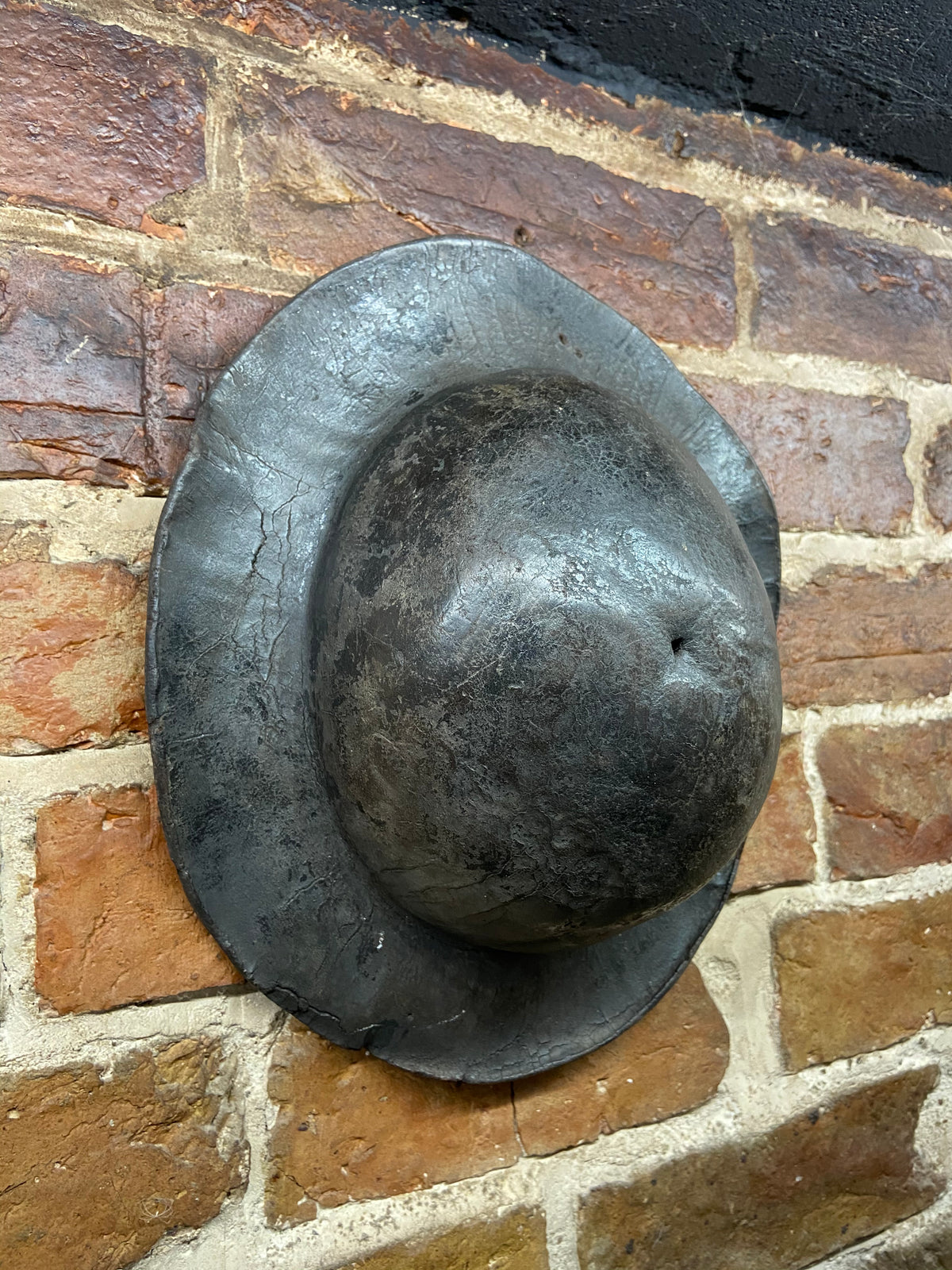 An early 19th century leather miner’s hat