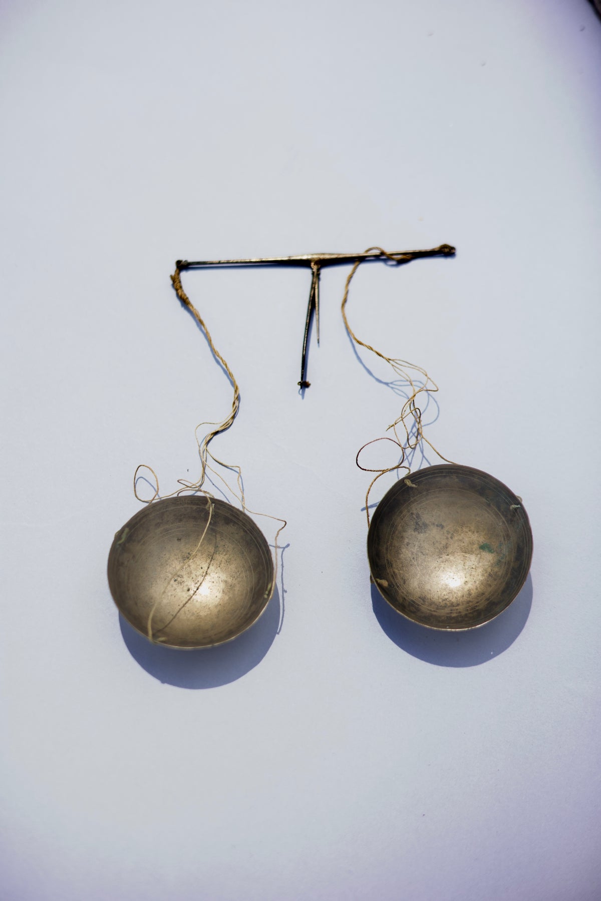 A rare set of 17th century apothecary scales in primitive case with witch marks
