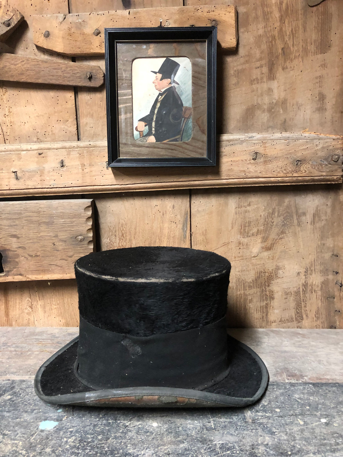 Naive portrait of a gentleman in a top hat c.1850