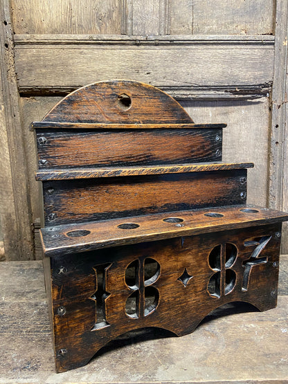 Large oak spoon rack dated 1887