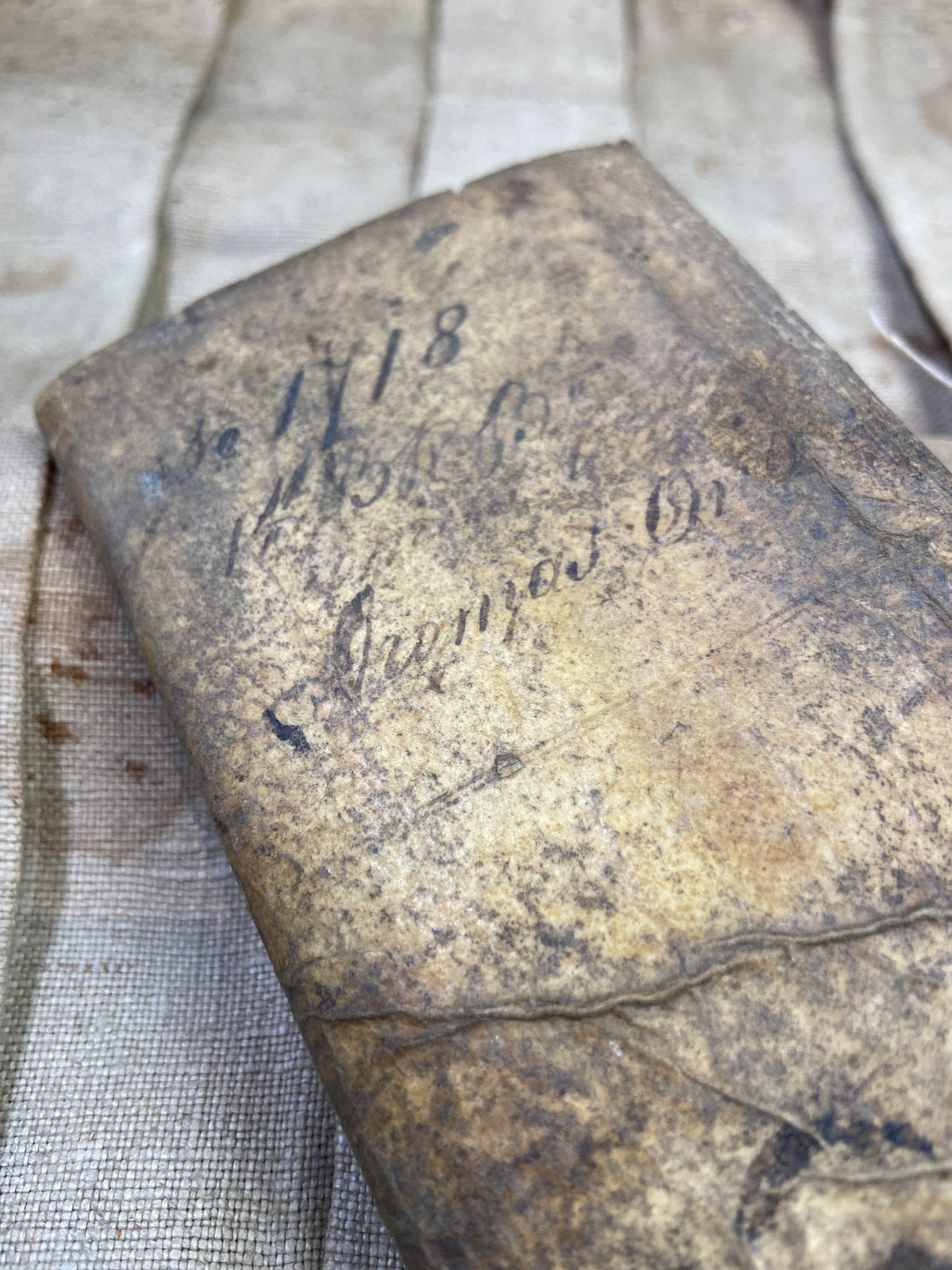 Unusual military canvas roll containing pay and account book for Thomas Onley 1st Battalion Rifles, 1839