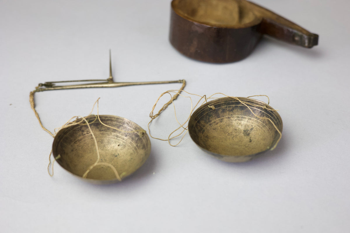 A rare set of 17th century apothecary scales in primitive case with witch marks