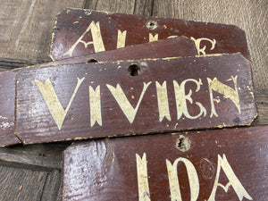 A set of 4 Victorian painted farmhouse shippon cattle name signs