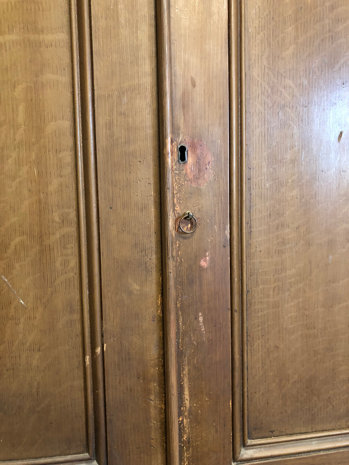 19th century North Country linen press in original oak scumble paint finish