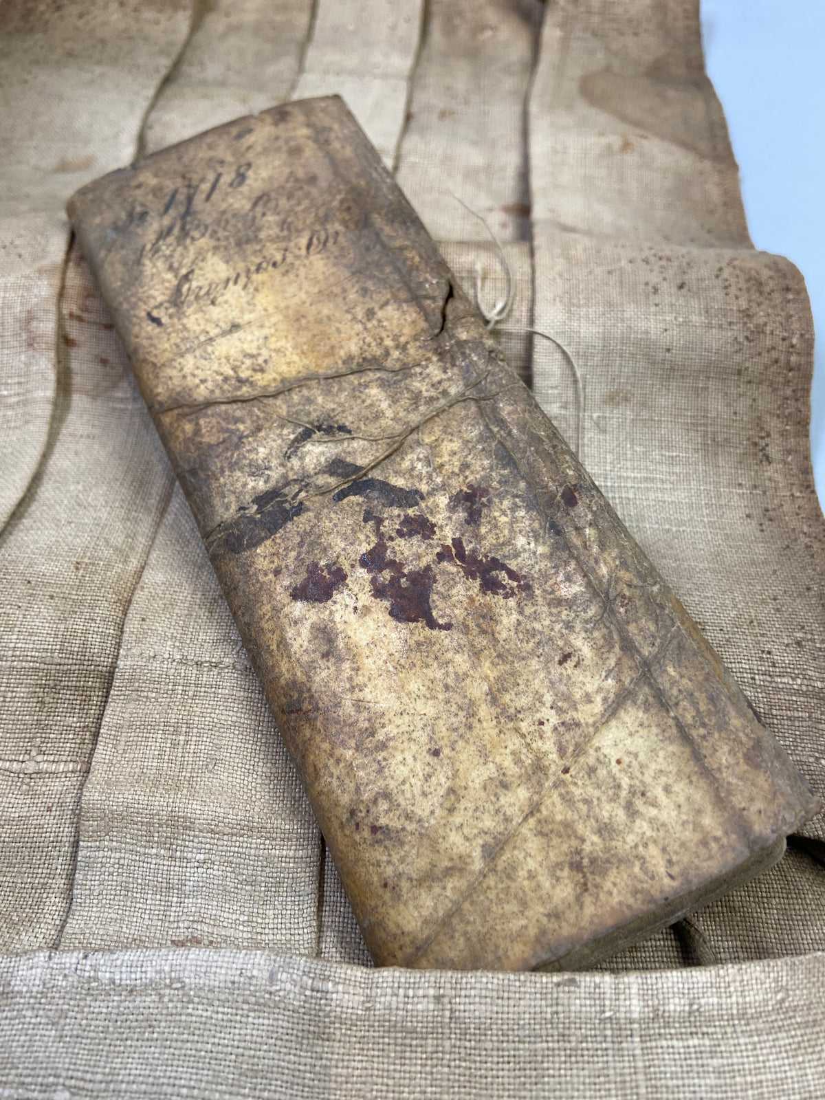 Unusual military canvas roll containing pay and account book for Thomas Onley 1st Battalion Rifles, 1839