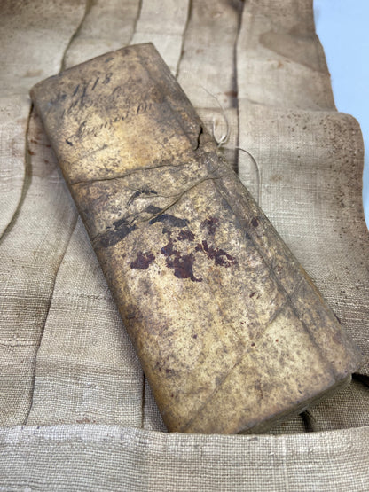 Unusual military canvas roll containing pay and account book for Thomas Onley 1st Battalion Rifles, 1839