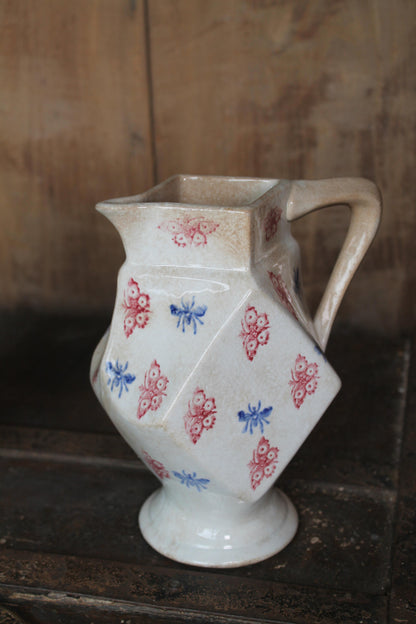 Unusual pair of 19th c spongeware jugs
