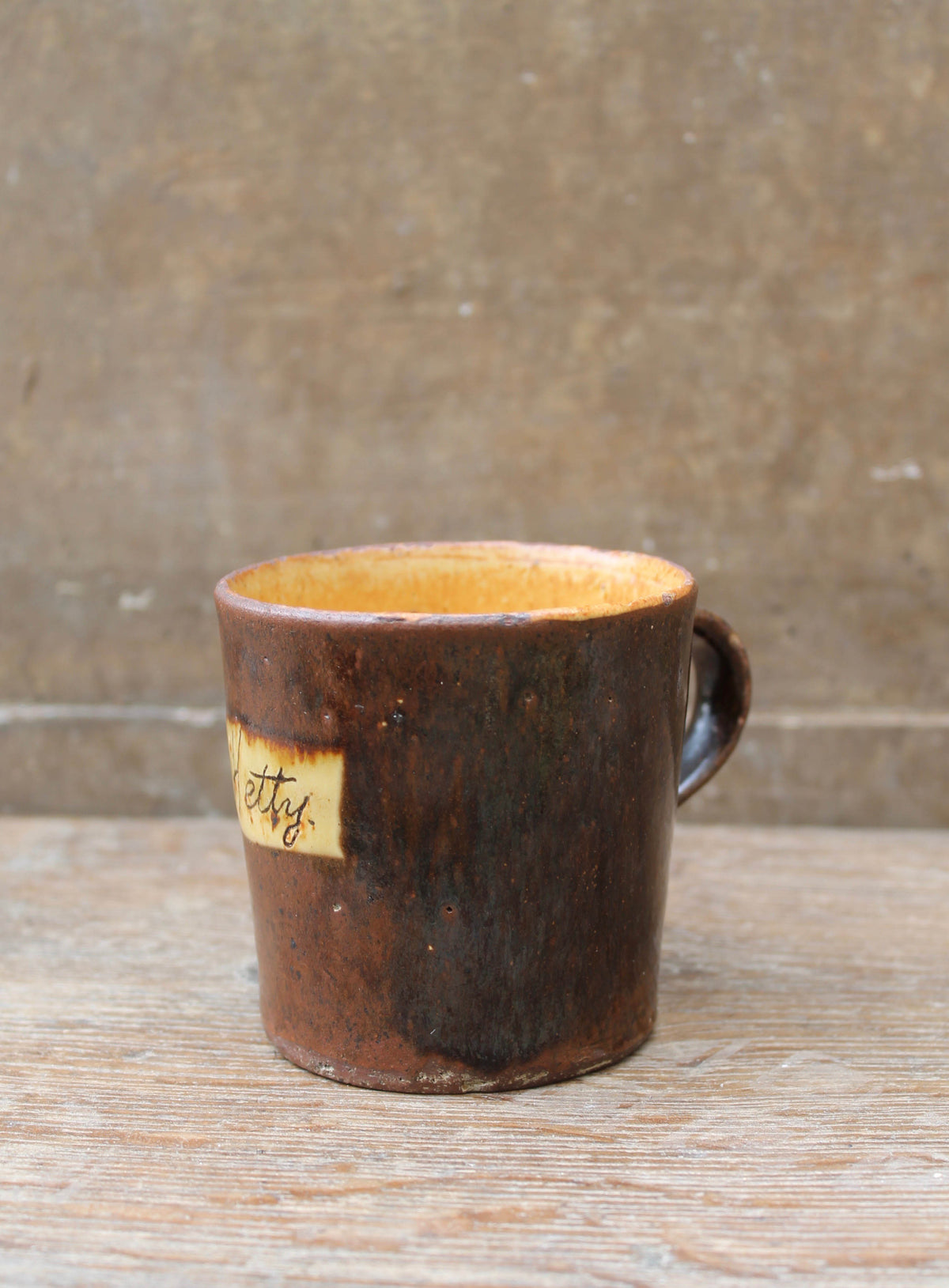 Slipware mug by Isaac Button of Soil Hill, Halifax- "Hetty"