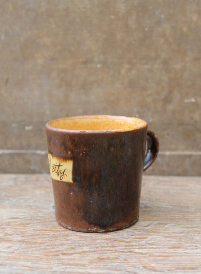 Slipware mug by Isaac Button of Soil Hill, Halifax- "Hetty"