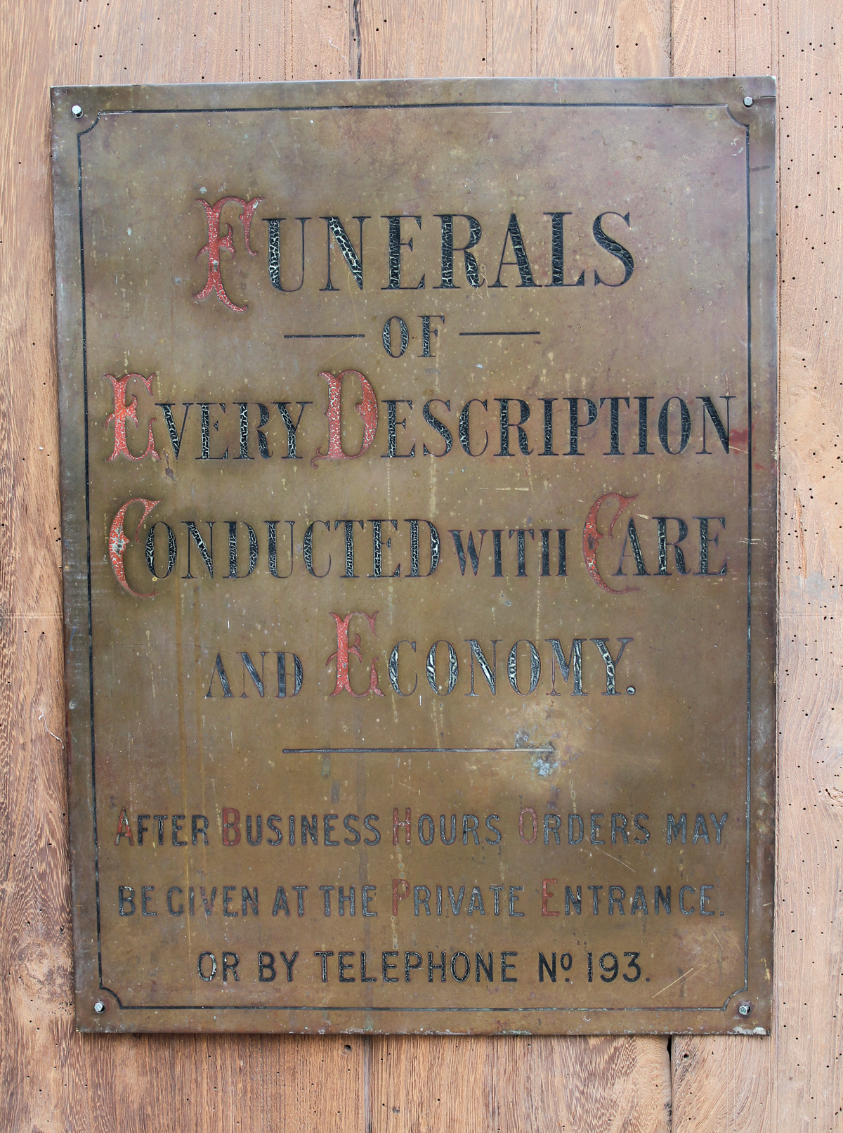 Early 20th century brass funeral sign