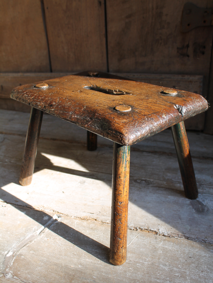 Early 19th century primitive elm stool