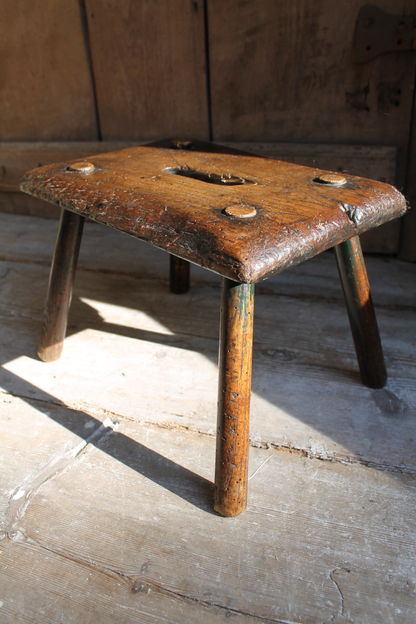 Early 19th century primitive elm stool