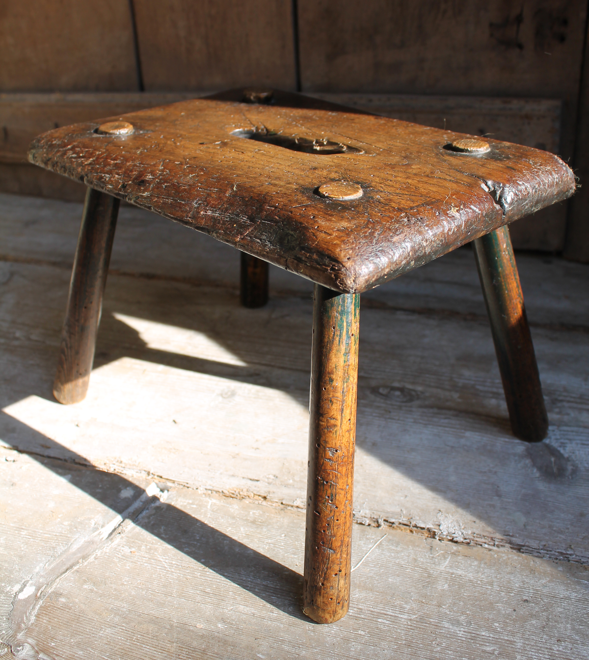 Early 19th century primitive elm stool