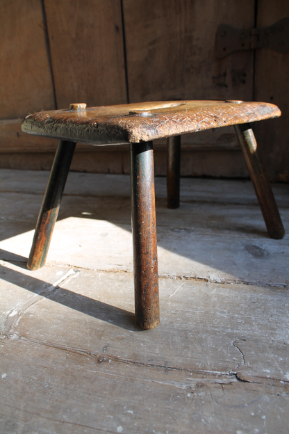 Early 19th century primitive elm stool