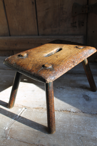 Early 19th century primitive elm stool