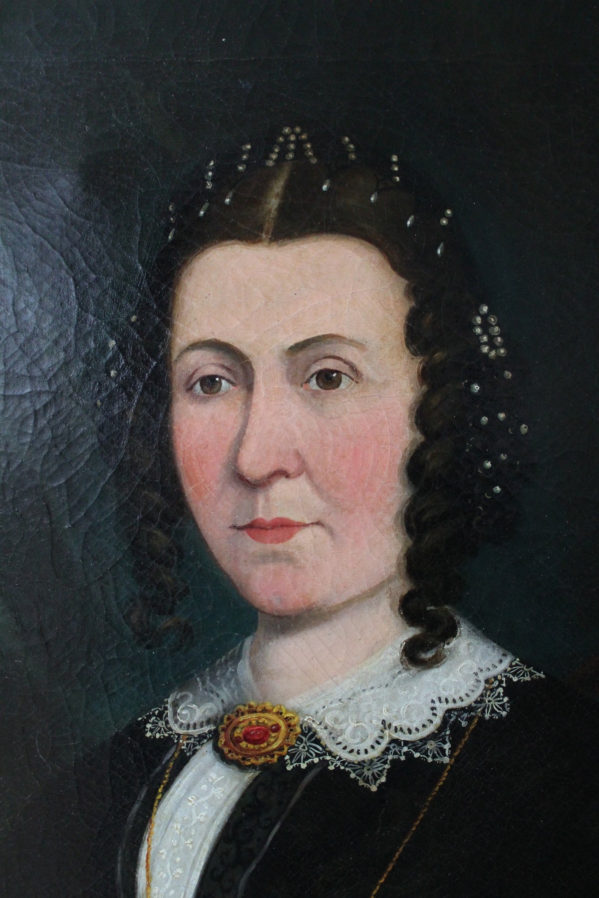 A large pair of portraits of a ship's captain and his wife
