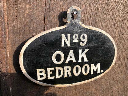 A set of five toleware country house servant's bell signs