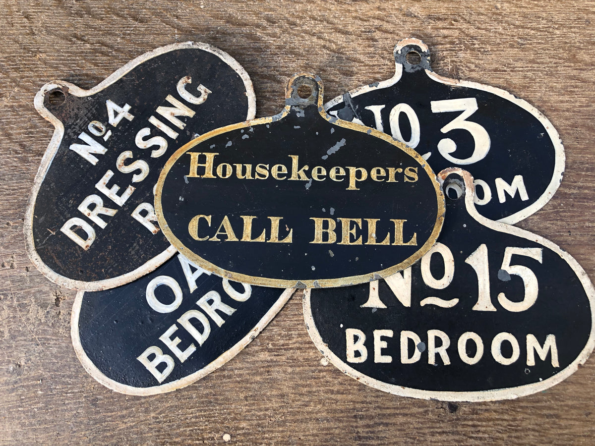 A set of five toleware country house servant's bell signs