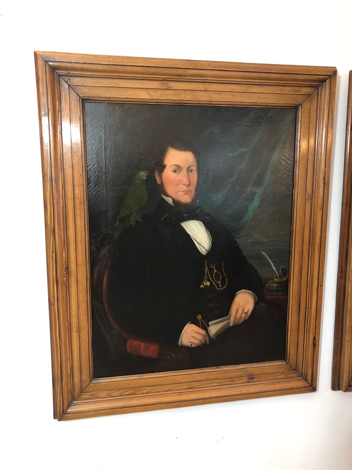A large pair of portraits of a ship's captain and his wife