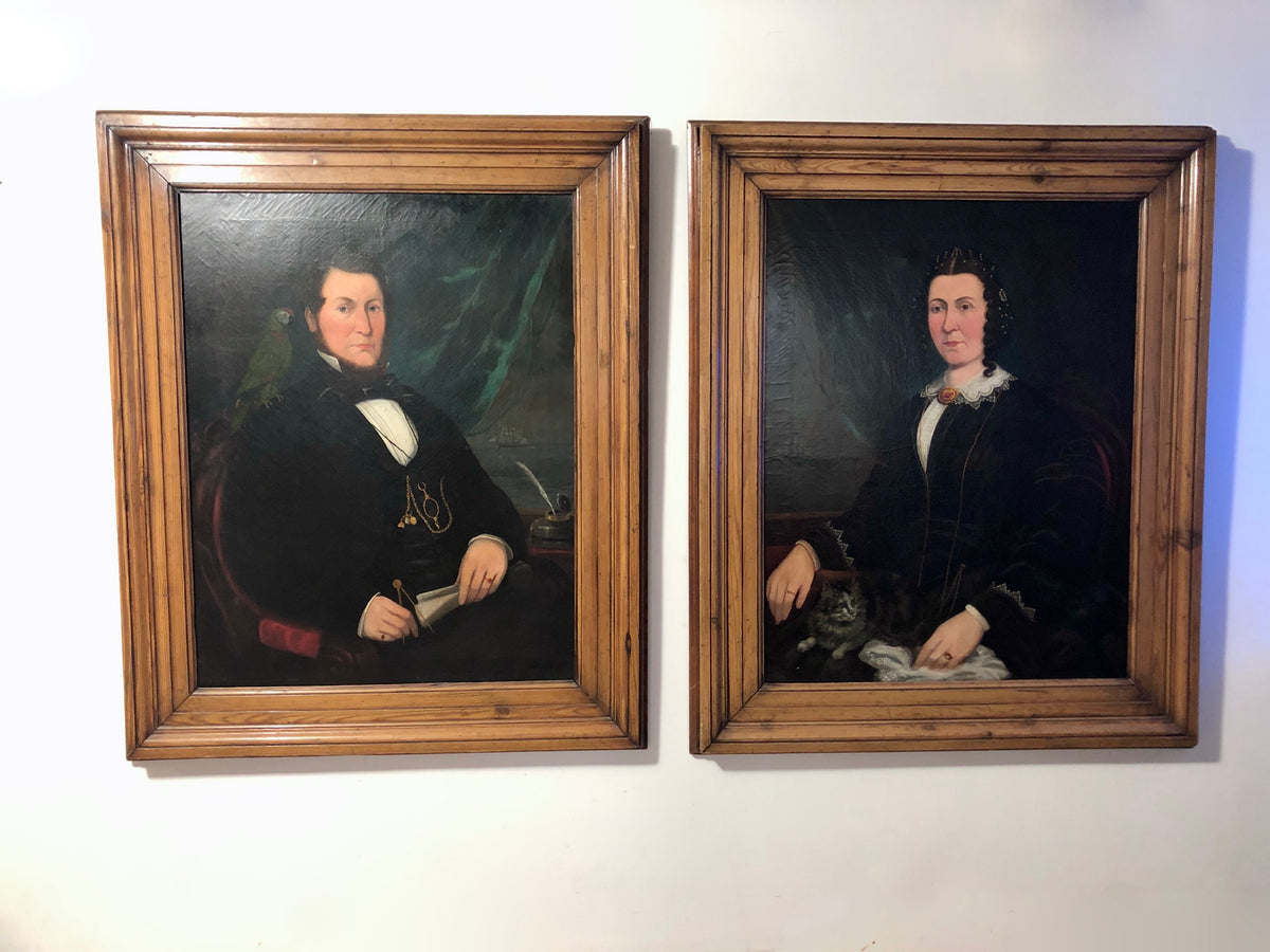A large pair of portraits of a ship's captain and his wife