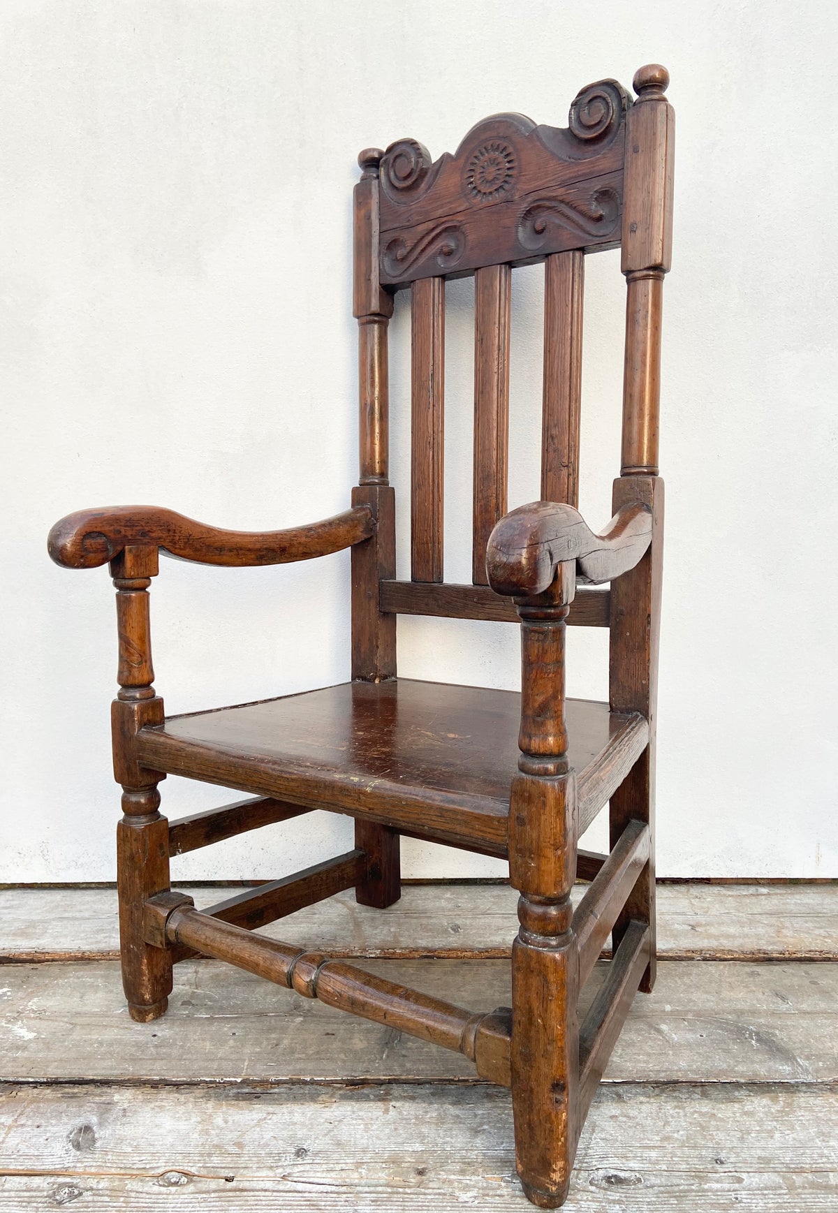 A large 17th c Scottish open arm chair from Braemar Castle