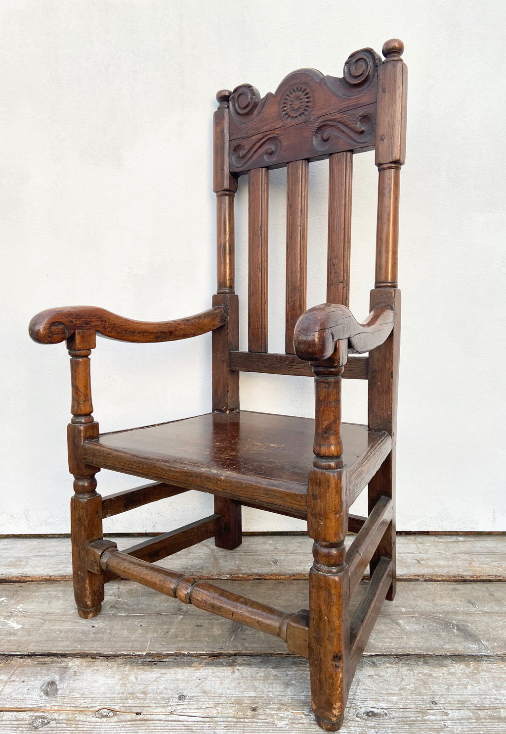 A large 17th c Scottish open arm chair from Braemar Castle
