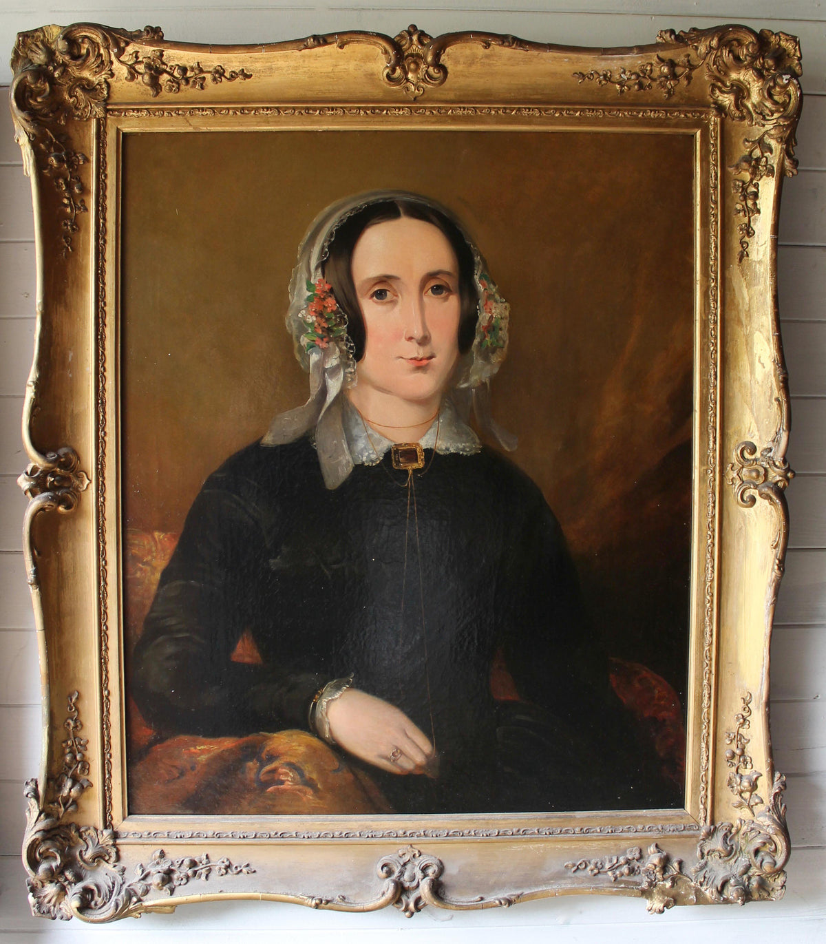 Pair of oil on canvas portraits of a Scottish ship's captain and his wife