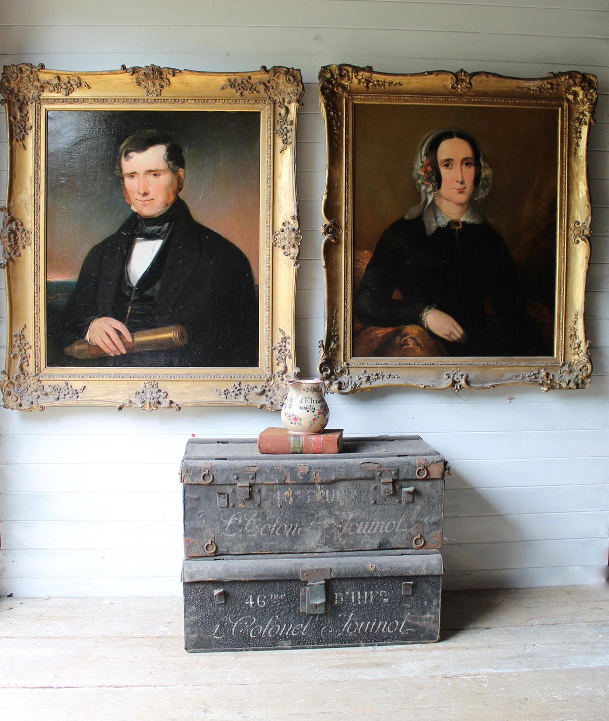 Pair of oil on canvas portraits of a Scottish ship's captain and his wife