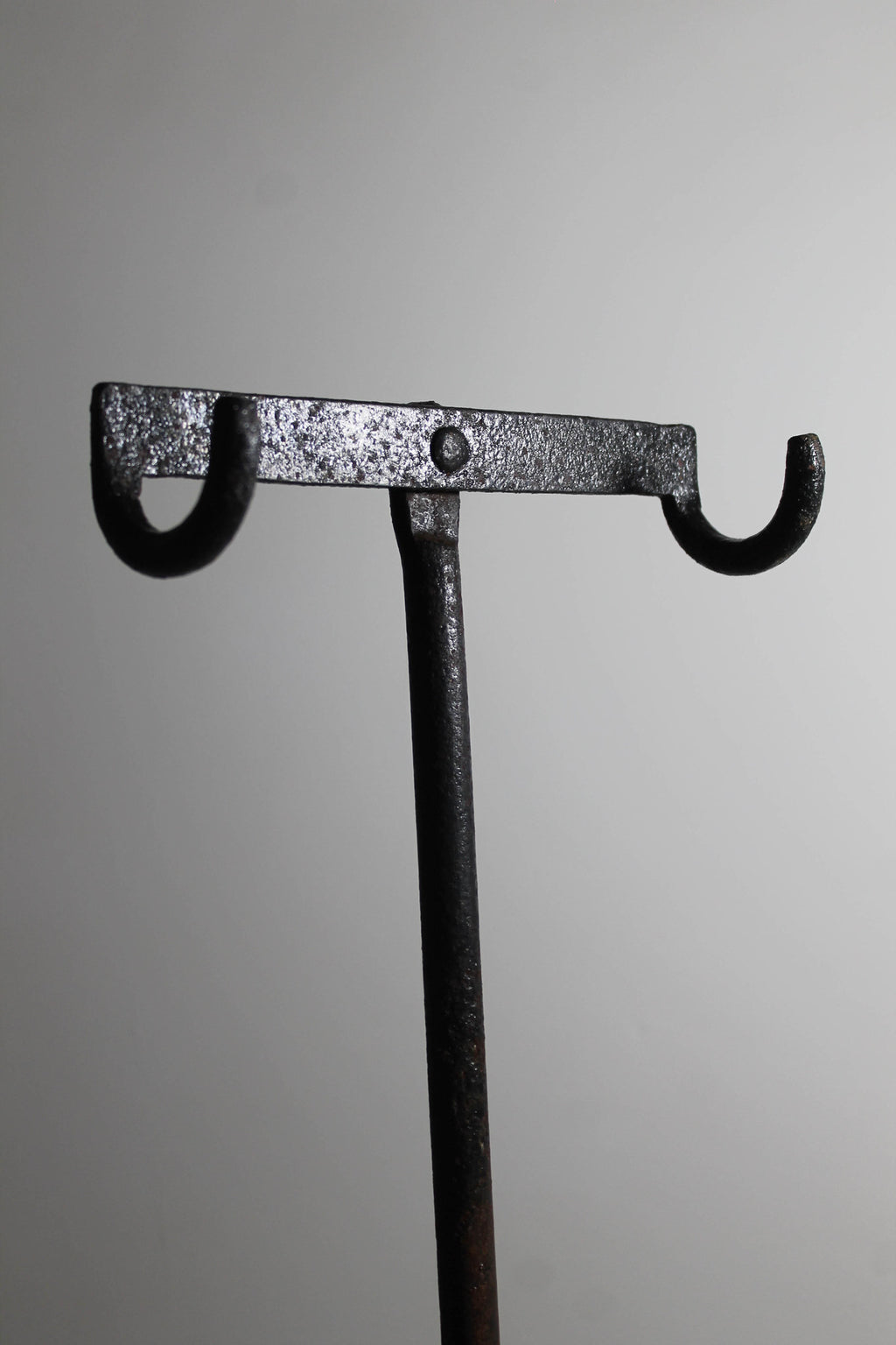 An English Victorian cast iron cycle stand c. 1875