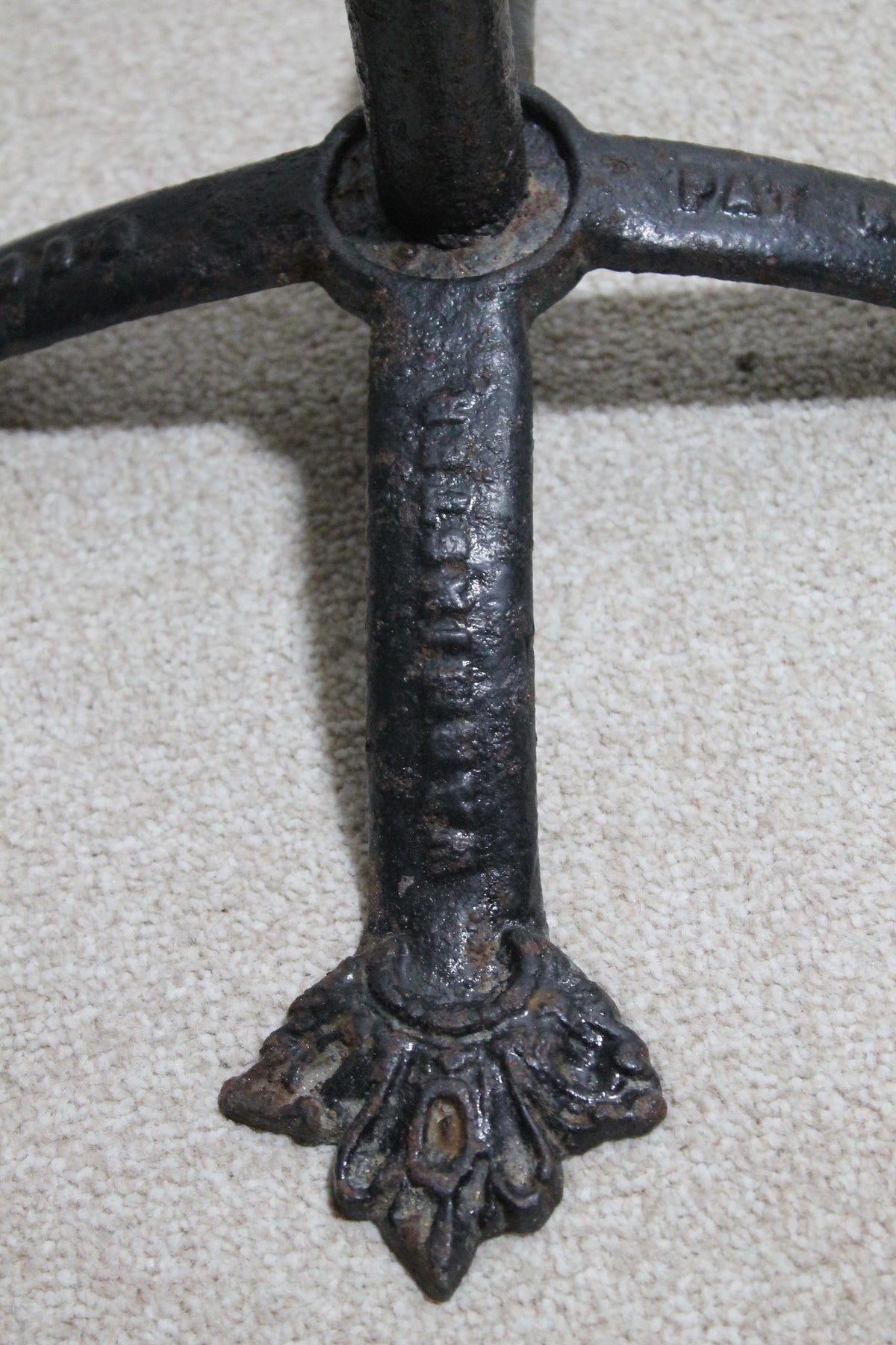 An English Victorian cast iron cycle stand c. 1875