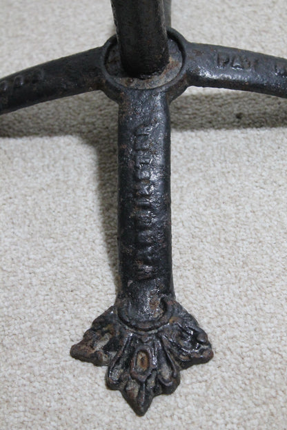 An English Victorian cast iron cycle stand c. 1875
