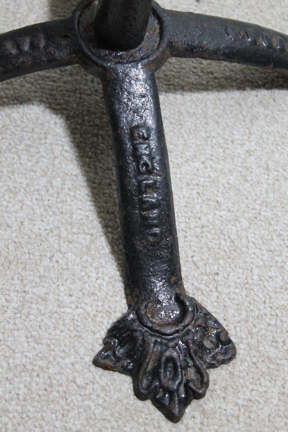 An English Victorian cast iron cycle stand c. 1875