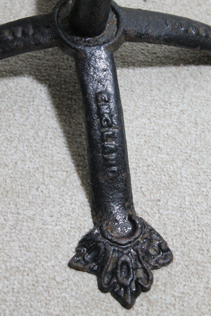 An English Victorian cast iron cycle stand c. 1875