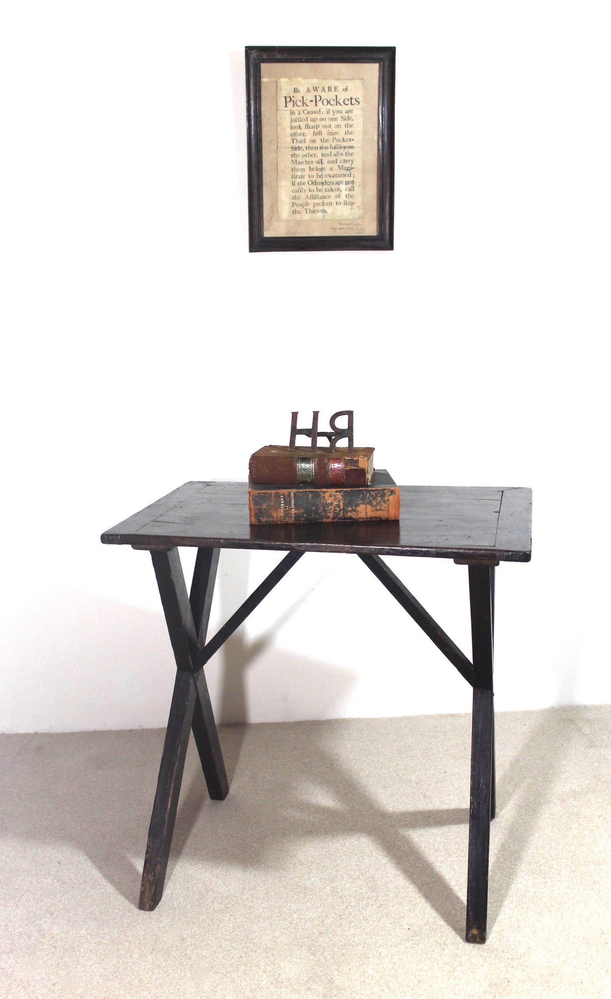A mid 19th century English tavern table in the original finish