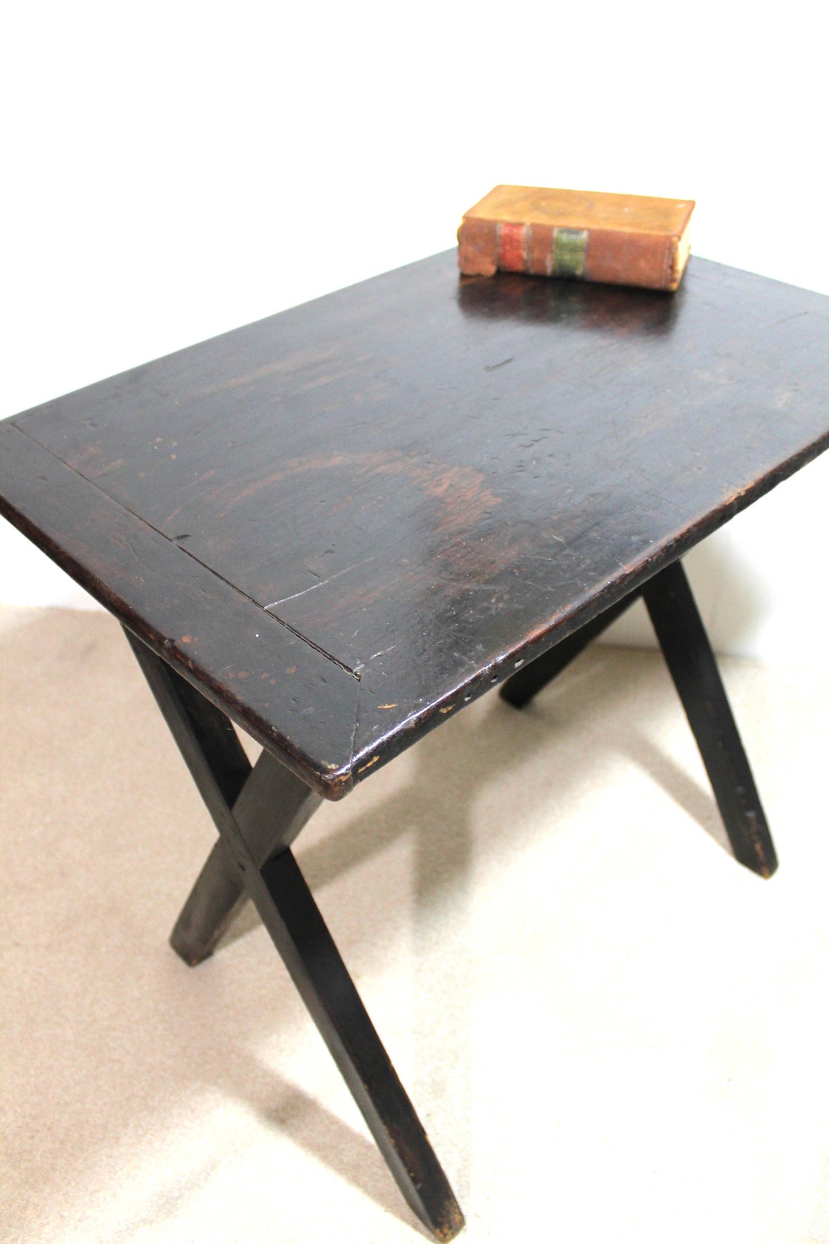 A mid 19th century English tavern table in the original finish
