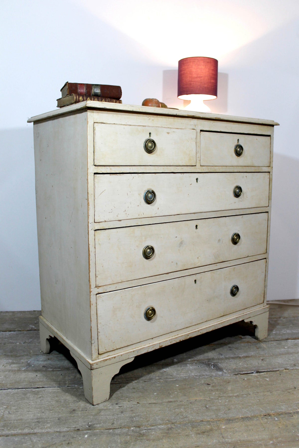 19th century chest of drawers washed back to the original paint