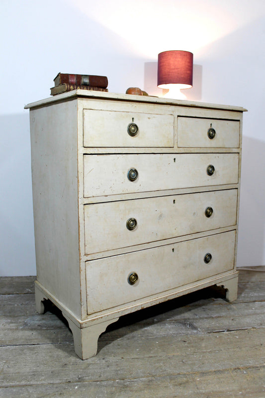 19th century chest of drawers washed back to the original paint