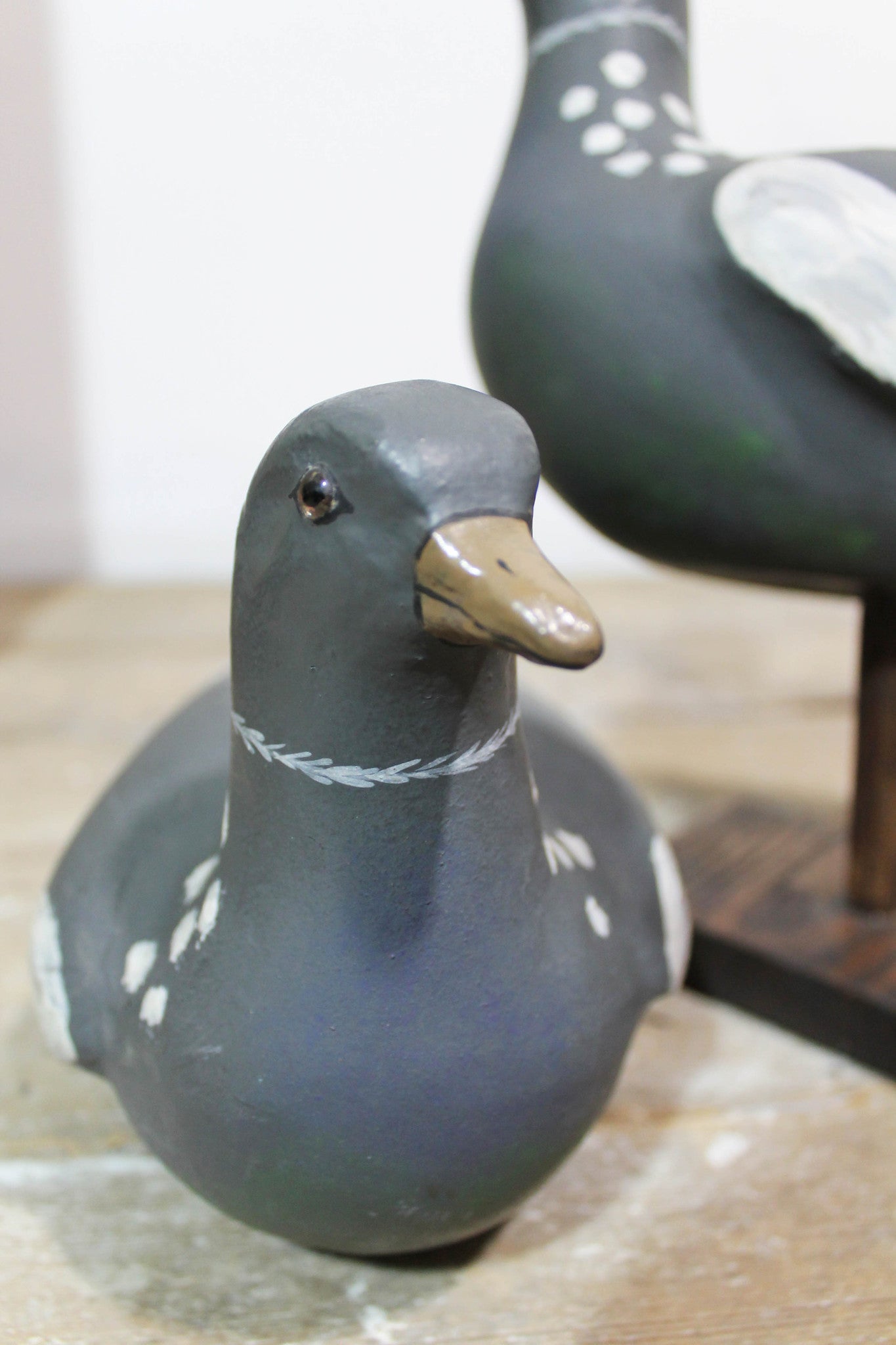 A pair of papier mache decoy pigeons from Plas Gwyn House, Anglesey