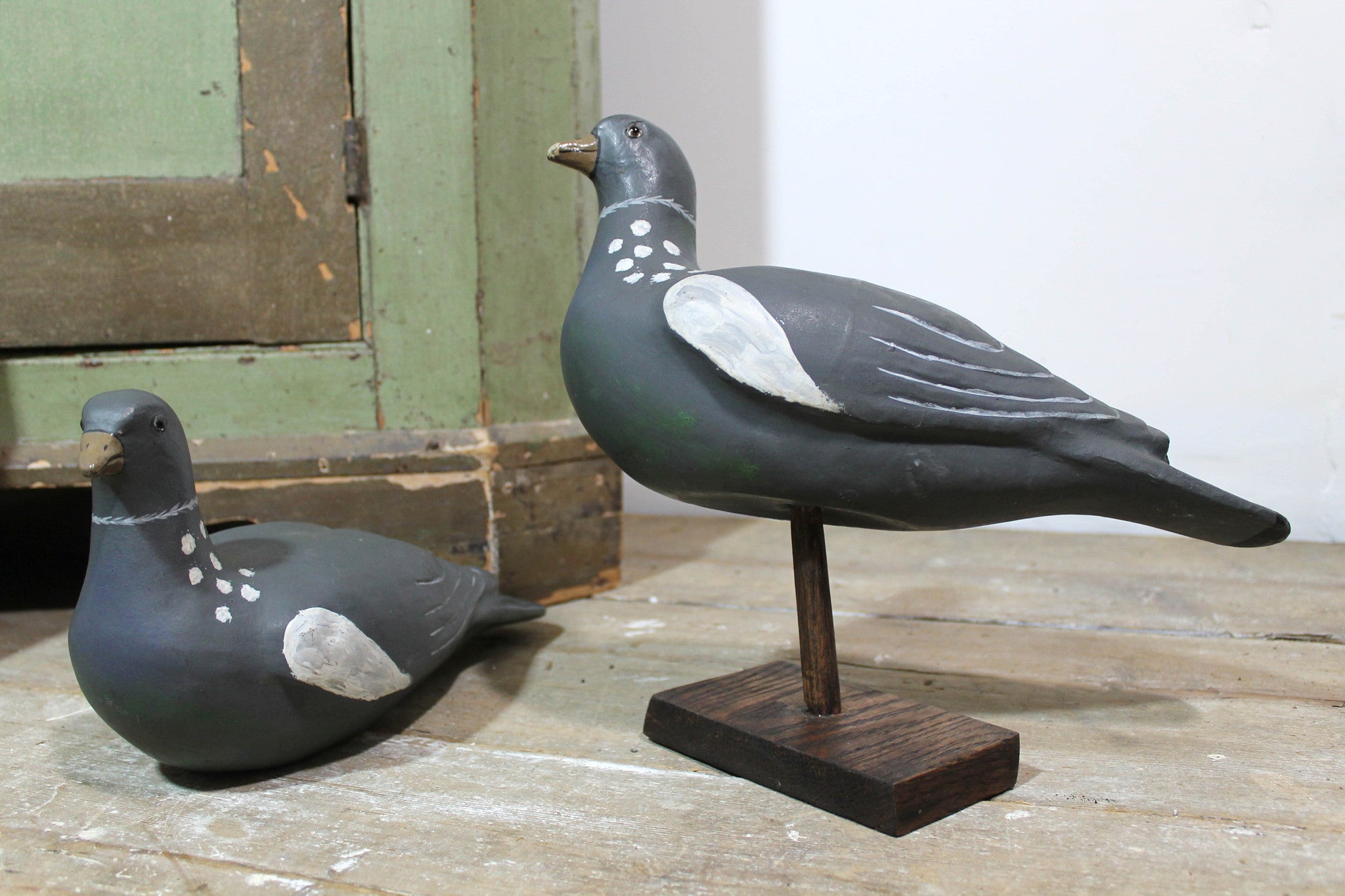 A pair of papier mache decoy pigeons from Plas Gwyn House, Anglesey