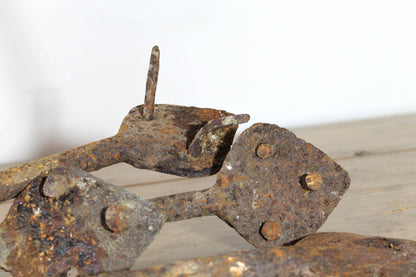 Set of five large 18th century game hooks