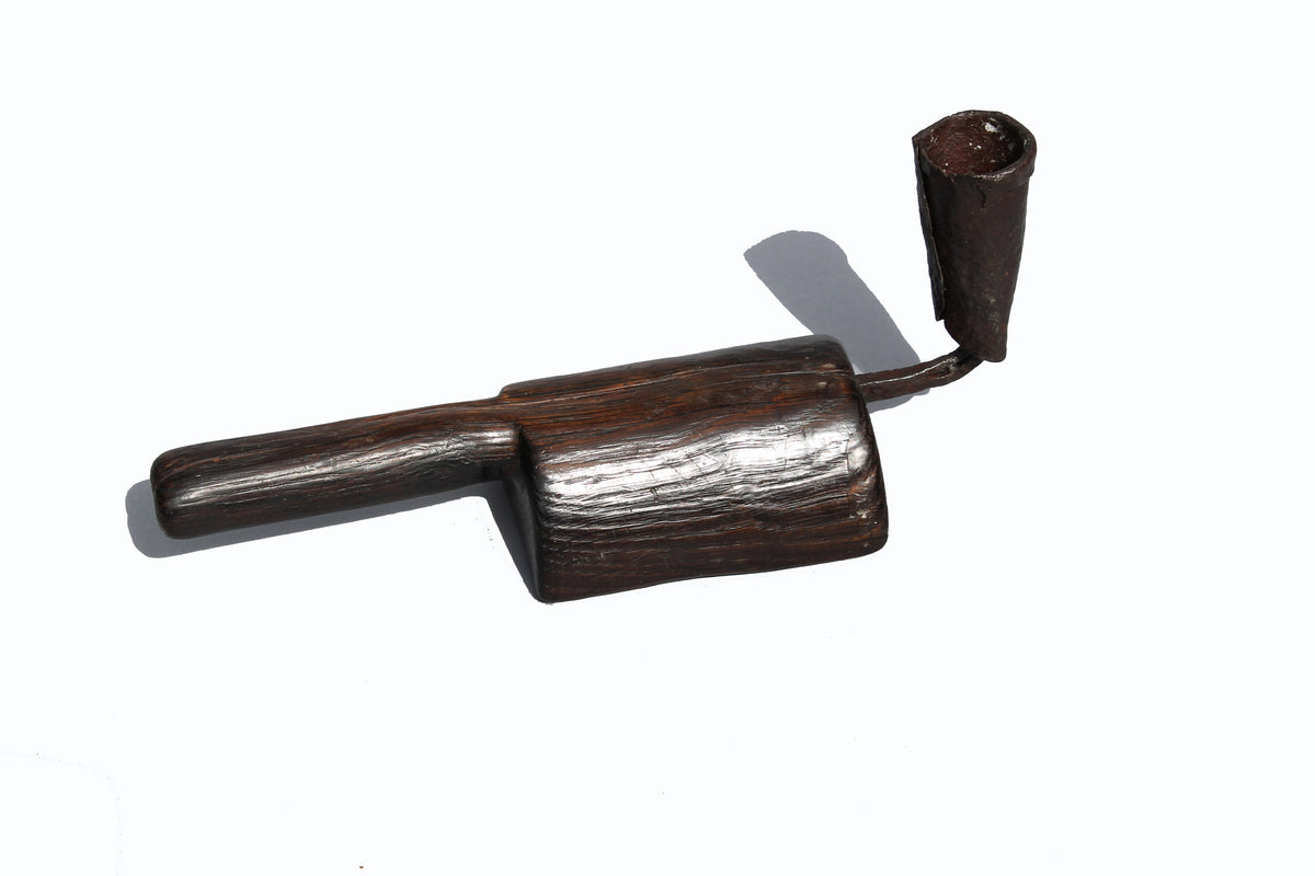Unusual 18th century oak 'go to bed' candle holder