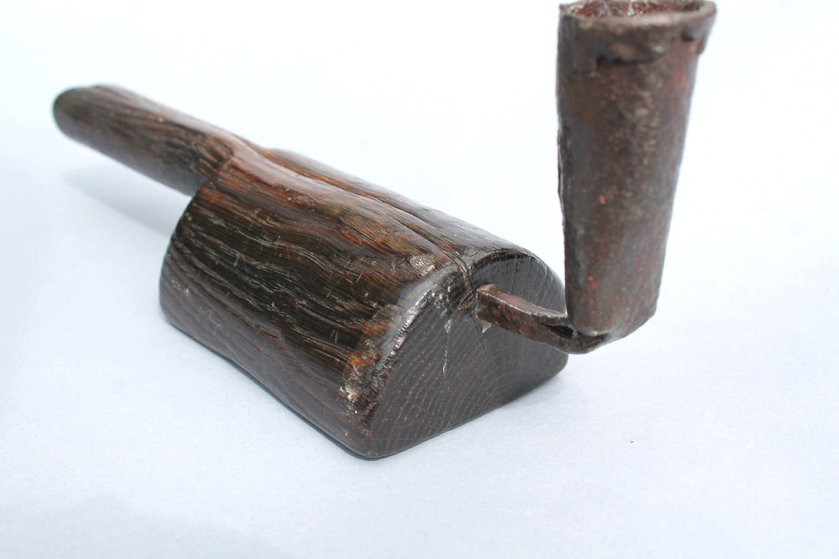 Unusual 18th century oak 'go to bed' candle holder