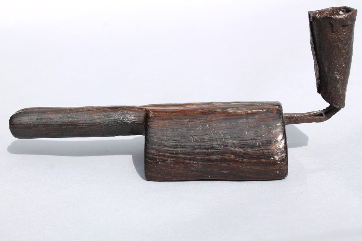 Unusual 18th century oak 'go to bed' candle holder