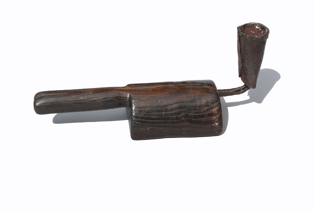 Unusual 18th century oak 'go to bed' candle holder