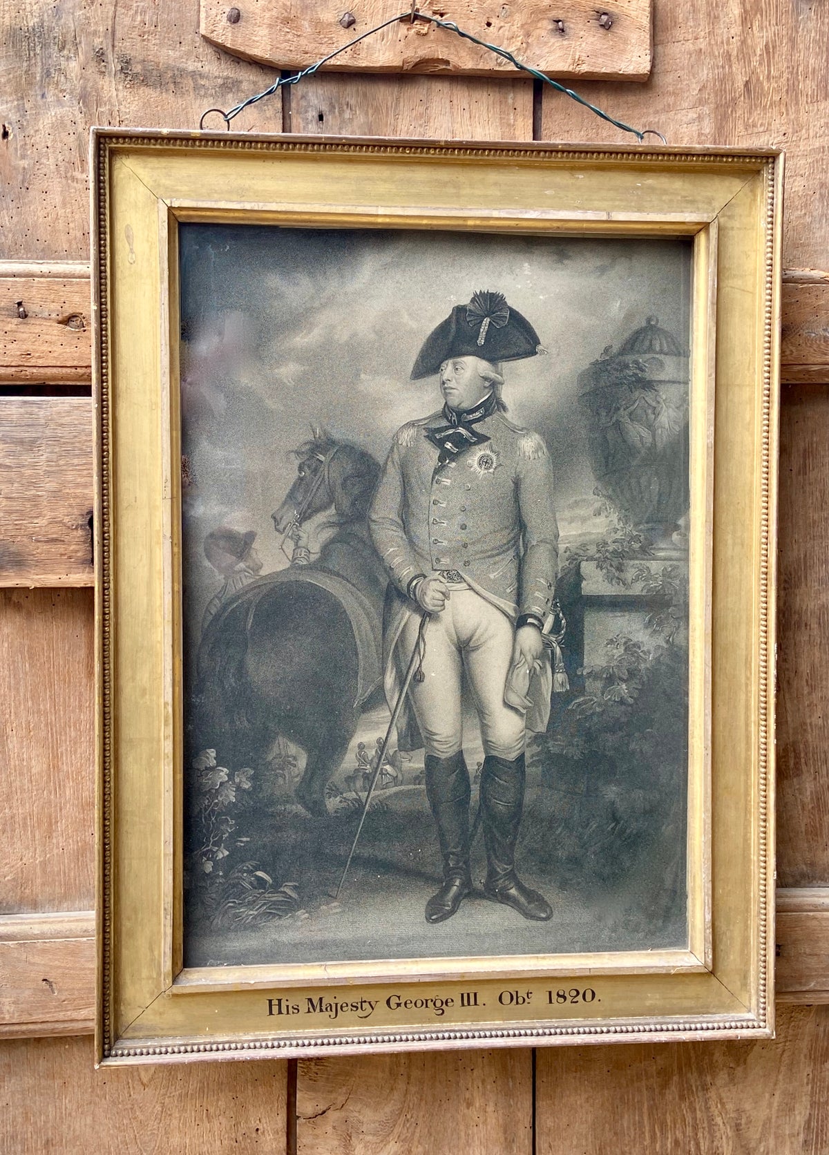 A large stipple and line engraving of King George III with original frame & glass