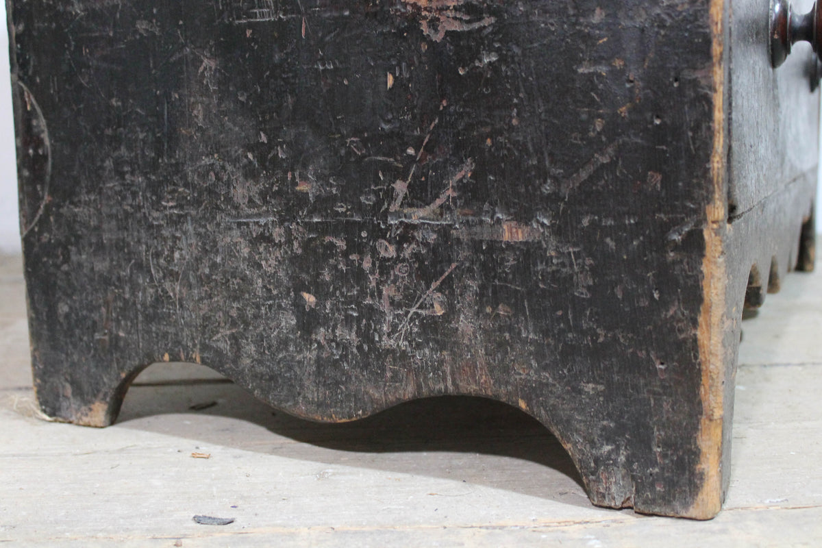 A George III chest of drawers of small proportions in original condition