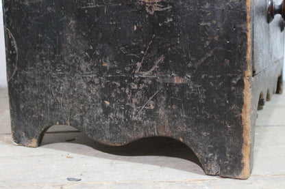 A George III chest of drawers of small proportions in original condition