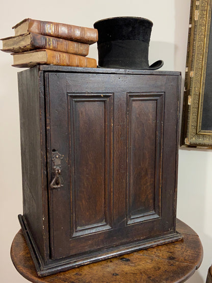 A delightful 19th century Welsh spice cabinet in the original finish