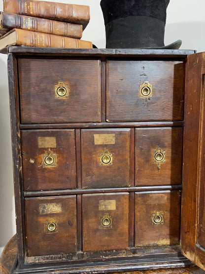 A delightful 19th century Welsh spice cabinet in the original finish