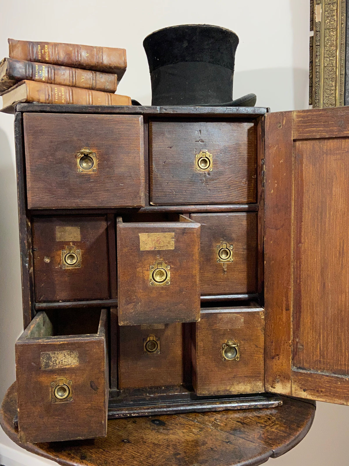 A delightful 19th century Welsh spice cabinet in the original finish